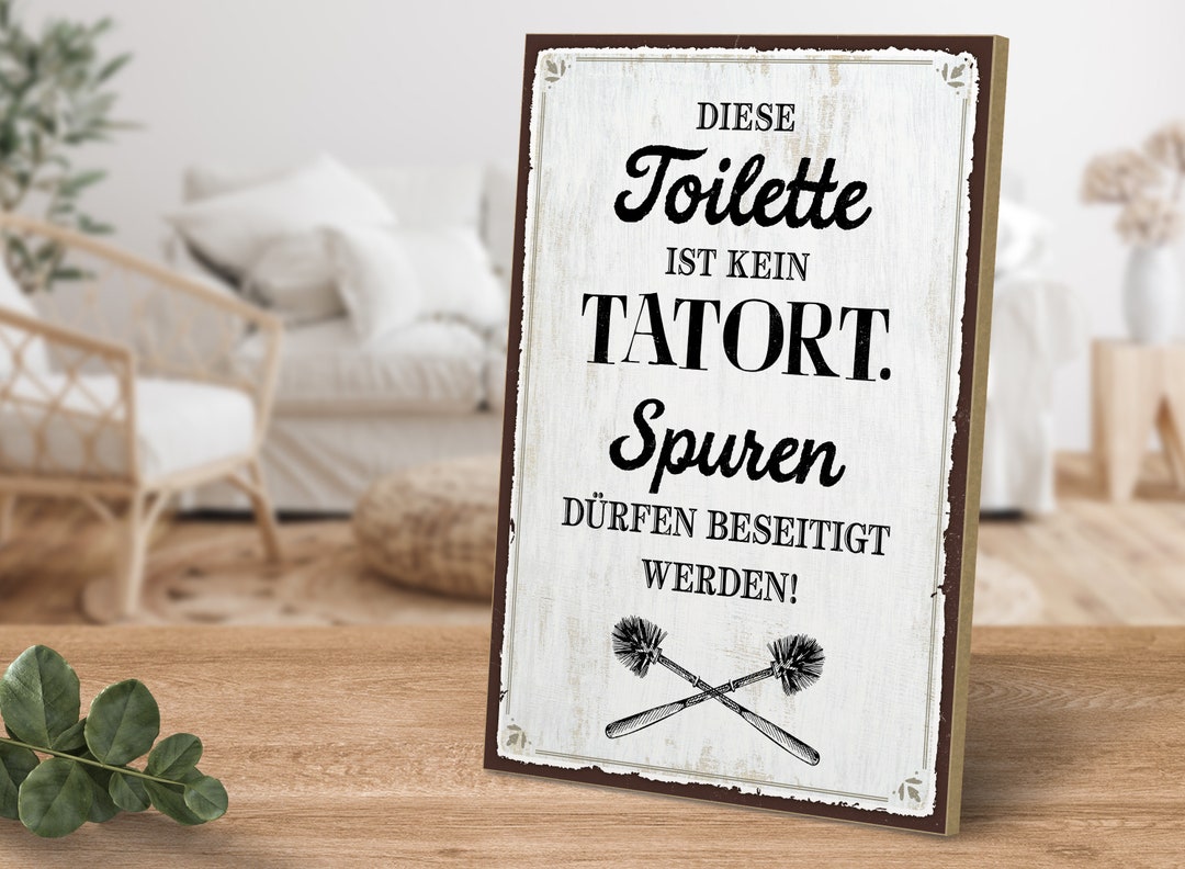 Holzschild mit Spruch Die Toilette ist