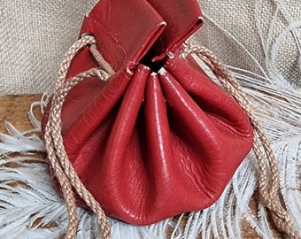 Red leather drawstring pouch.