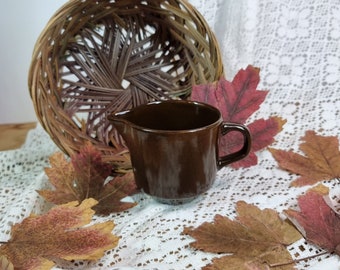 New Zealand pottery.  Little brown jug.