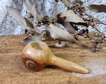 Hand carved wooden pipe.