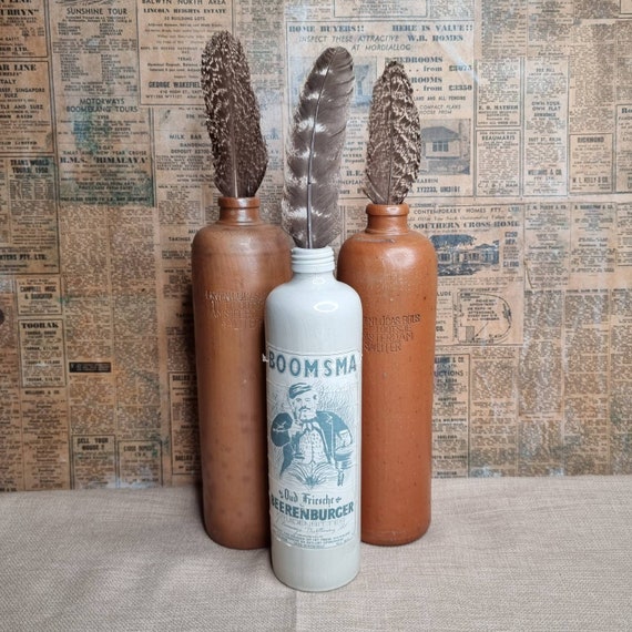 Old pottery bottles. Each sold seperately.