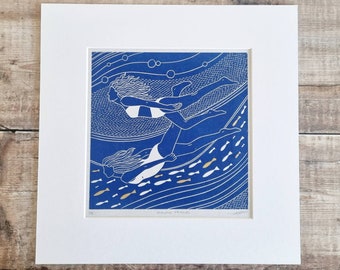 Flowing friends - Original linocut print of two women swimming underwater handfinished with gold fish