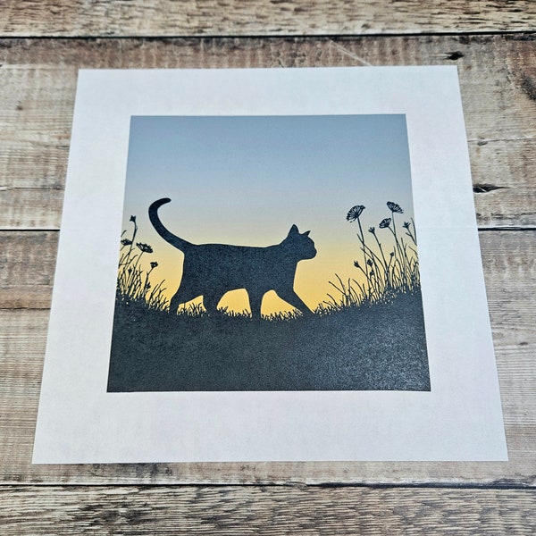 Original limited edition reduction linocut print of a cat silhouetted against the sky between long grass (21)