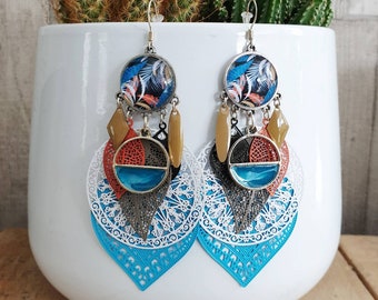 Ethnic and trooical fancy earrings with turquoise, orange, white and brown blue. Glass cabochon. Unique handmade