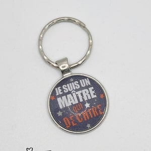 Zilveren sleutelhanger met cabochon bedrukte 25mm marine boodschap "Ik ben een meester die tranen" geschenkpakket aangeboden ideaal cadeau einde van het jaar