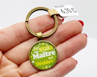 Porte clé bronze et vert avec cabochon à message « je suis un maître qui déchire » (paquet cadeau offert) idéal cadeau fin d’année