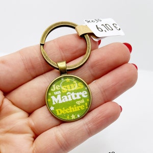 Bronzen en groene sleutelhanger met cabochon boodschap "Ik ben een meester die tranent" (geschenkpakket aangeboden) ideaal cadeau einde van het jaar