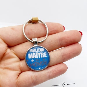 Zilveren sleutelhanger met cabochon bedrukt 25mm blauwe boodschap "beste meester ter wereld" (geschenkpakket aangeboden) ideaal cadeau einde van het jaar