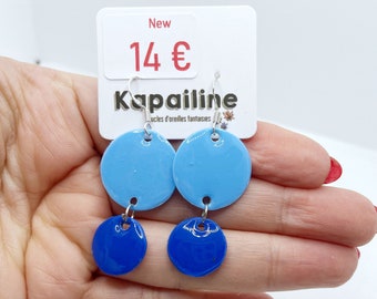 May include: Blue dangle earrings with a two-circle design. The top circle is light blue, and the bottom circle is a darker blue. The earrings are hanging from silver hooks. The tag says "New".