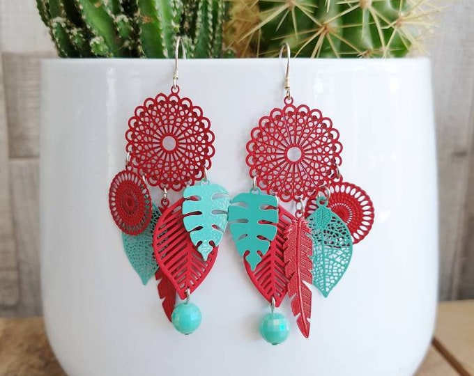 fancy red and blue-green earrings