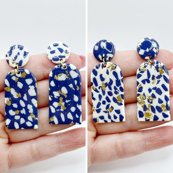 Lightweight artisanal bohemian chic fancy earrings in white and navy blue arch polymer clay handmade single stud base