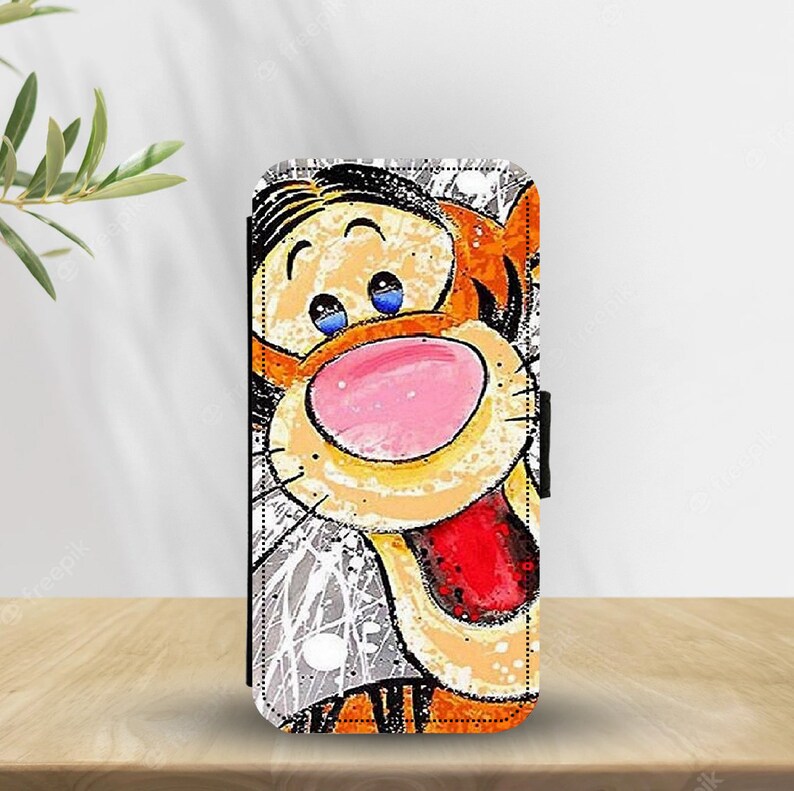 May include: A colorful illustration of Tigger from Winnie the Pooh. The illustration is painted in a cartoon style with a white splatter background. Tigger is looking directly at the viewer with a big smile and his tongue sticking out.