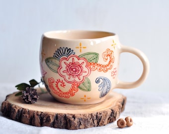 Handmade Ceramic Coffee Mug: Beige Pottery with Indian Floral Design