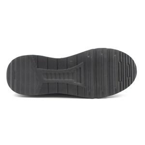 Puede incluir: Suela de goma negra de una zapatilla con un patr&oacute;n de banda de rodadura texturizado.