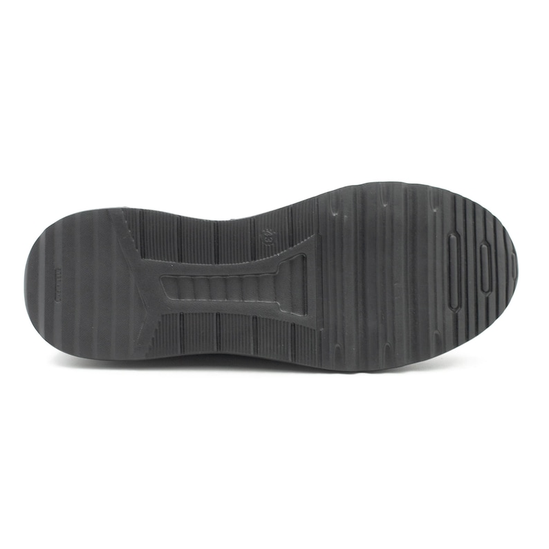 Puede incluir: Suela de goma negra de una zapatilla con un patr&oacute;n de banda de rodadura texturizado.