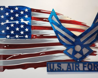 May include: A distressed metal American flag with a blue Air Force emblem and the text "U.S. AIR FORCE" below.