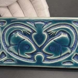 Art Pottery Fish Tile Cobalt Blue Carved Relief Celtic Double Fish Smiling