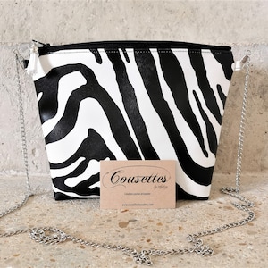 Unique creation pouch in zebra vegan leather made in France and handcrafted. Quilts by Audrey