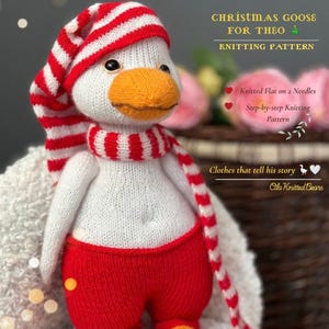 May include: A knitted white goose toy with an orange beak, wearing a red and white striped hat and scarf, and solid red pants. Text on the image reads: CHRISTMAS GOOSE FOR THEO KNITTING PATTERN, Knitted Flat on 2 Needles, Step-by-step Knitting Pattern, Clothes that tell his story, Ola Knitted Bears.