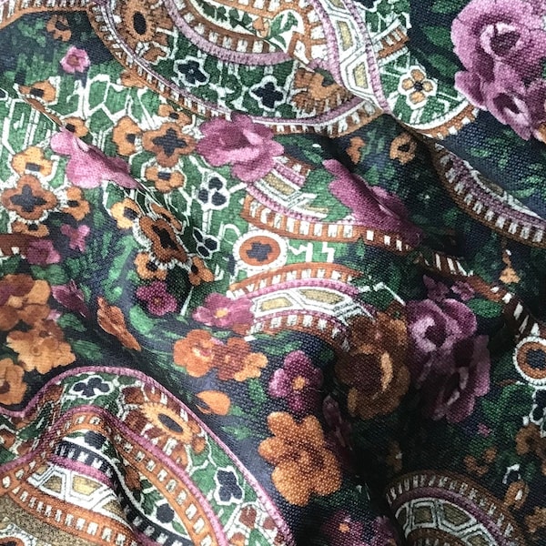 Purple and dark green paisley type design soft printed polyester fine knit crepe dressmaking fabric 154cm 56” wide, per metre