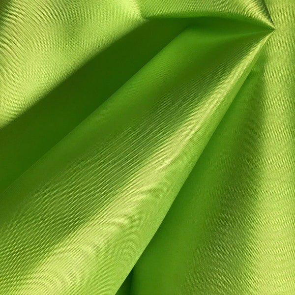 Vintage lime green dress lining 92cm 36”  wide, available per metre