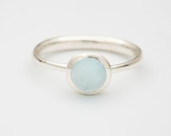 Aquamarine polished sterling silver ring.