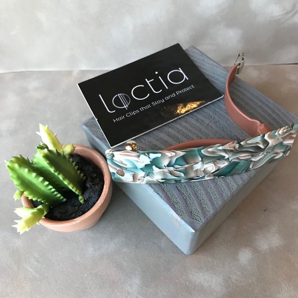 Loctia lined green and brown medium and wide acetate barrette hair clip. Stays in fine hair too