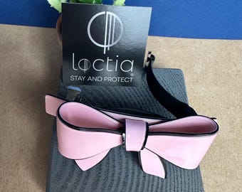 Fermaglio per capelli in acetato rosa con fiocco grande antiscivolo foderato Loctia
