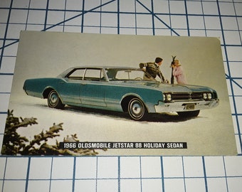 1966 OLDSMOBILE JETSTAR 88 Holiday Sedan Automobile Car Postcard Advertising Auto Vintage Antique