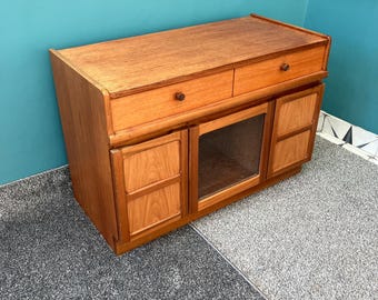 A Mid Century Modern Teak Nathan Squares Drinks Cabinet made by Parker Knoll