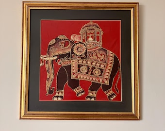 A Batik Elephant Framed and Glazed in Vibrant Red an Gold 51 x 51cm