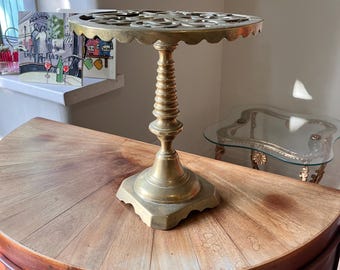 A Vintage Brass Trivet Plant Stand with Pierced Top