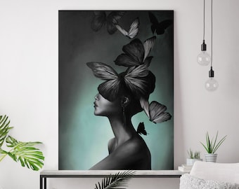 May include: A black and white illustration of a woman with butterflies on her head. The background is a teal color.