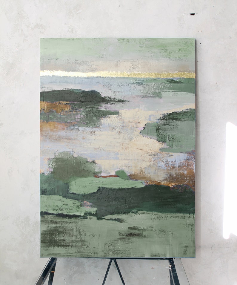 May include: Abstract landscape painting with green, blue, and gold hues. The painting features a series of horizontal brushstrokes, creating a sense of depth and movement. The gold accents add a touch of luxury and sophistication.