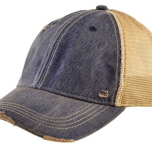 May include: A distressed blue denim baseball cap with a brown mesh back panel. The cap has a slightly curved brim and a distressed look.