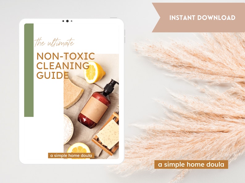 May include: A digital download guide titled "The Ultimate Non-Toxic Cleaning Guide" with a simple home doula logo. The guide cover features a brown bottle with a pump dispenser, a lemon, a bar of soap, and a sponge.