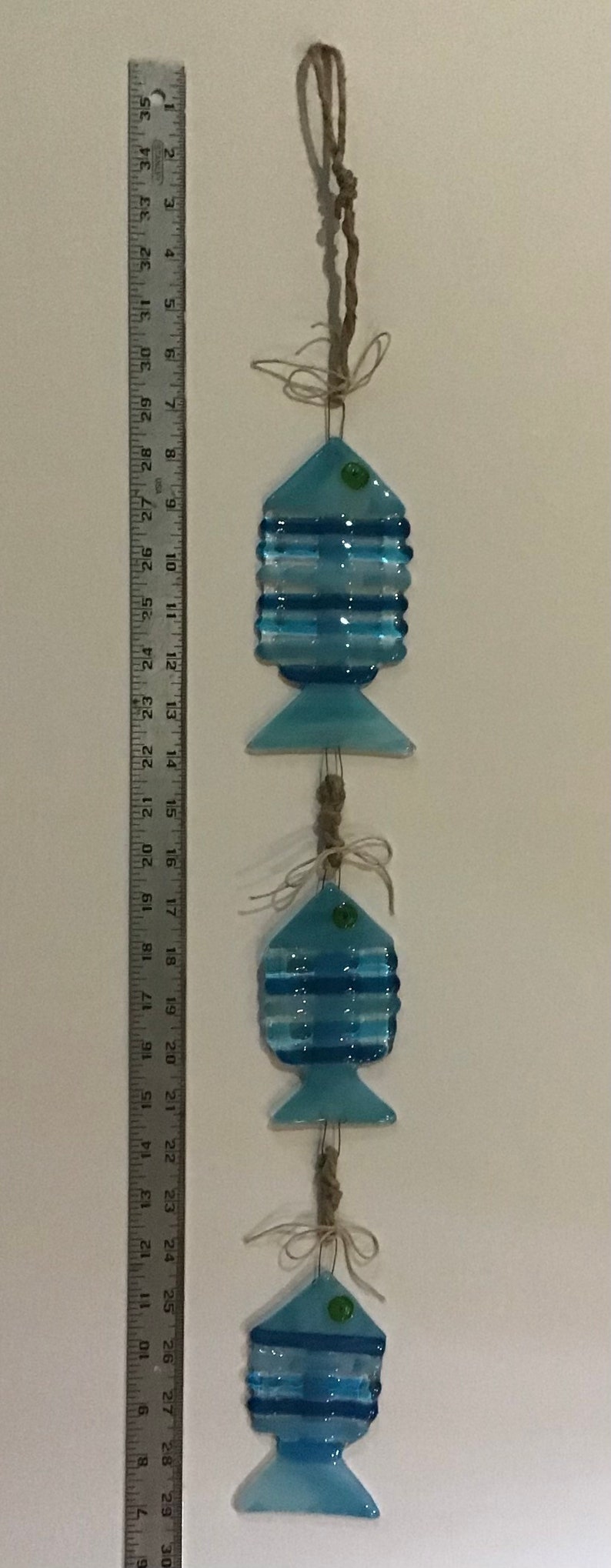 Spiny\u201d Fish in Turquoise and Greens Sun Catcher or Wall art.
