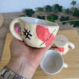 Handmade Coffee mug. Ceramic mugs in Pink and oatmeal tones. Unique design in pinch pot technique. Sold separately or as set.