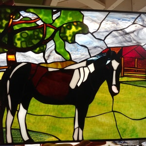 Custom orders turn your photos into a stained glass panel. 50.00 per square foot plus 1.00 per pattern piece.