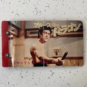 Album de cartes porte-bonheur Bruce Lee Yamakatsu - vintage 1974 acceptable - album uniquement