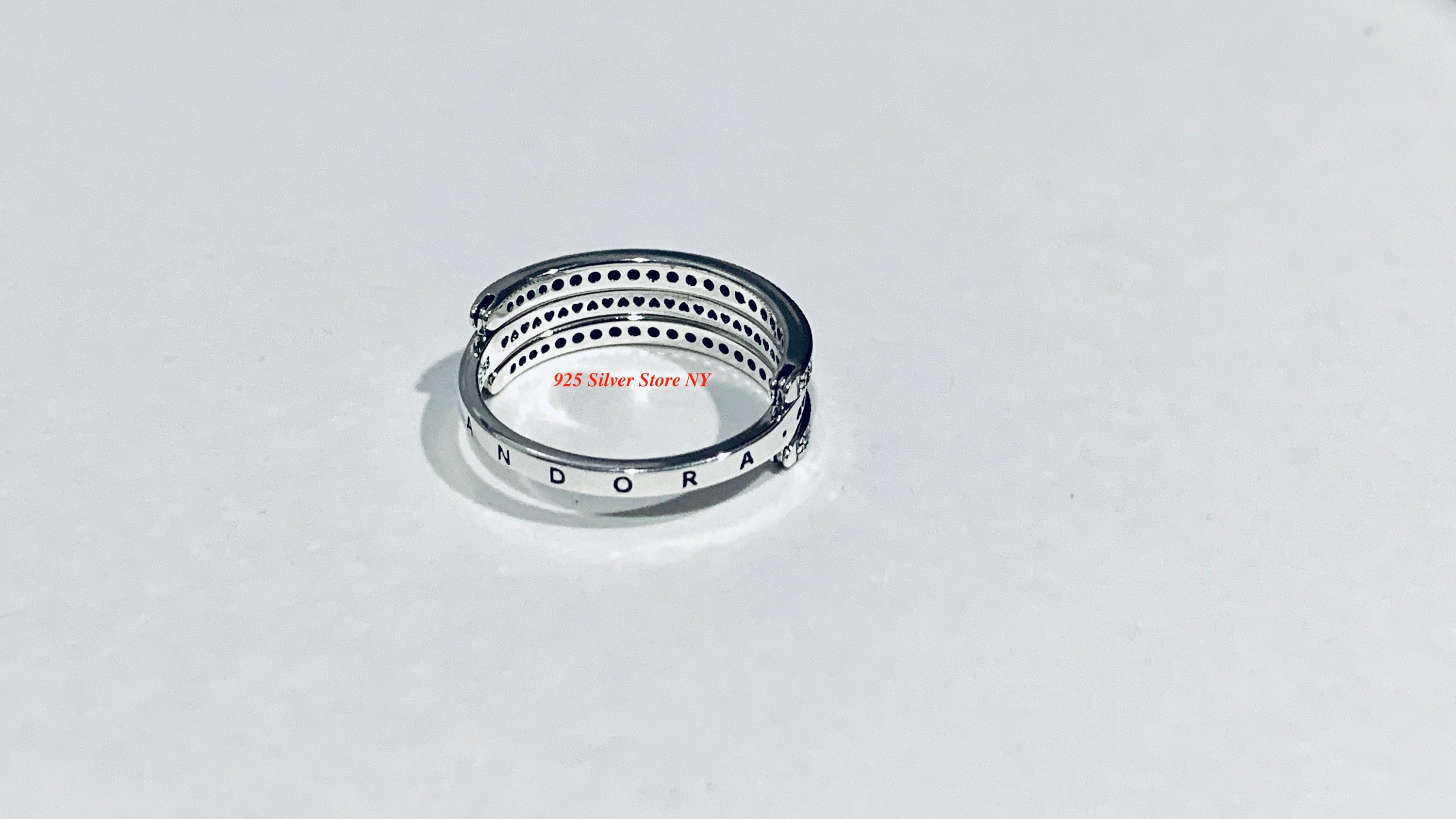 Silver Flipping Hearts Ring Clear CZ 