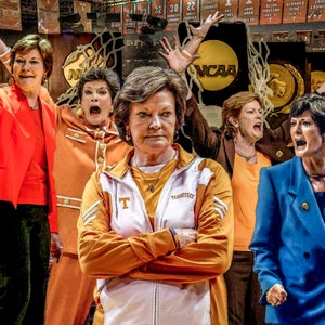 May include: A collage of seven women coaches in various poses, some with their arms crossed, some with their hands raised in the air, and some with their mouths open in a yell. The women are wearing different colored jackets and shirts, including orange, red, blue, and white. The background is a basketball court with a scoreboard and the NCAA logo.