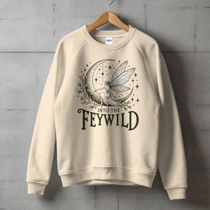 Into the Feywild dnd Sweatshirt. The Wild beyond the Witchlight sweater. Dnd feywild adventure sweatshirt. Witchlight carnival. Dnd Fairy