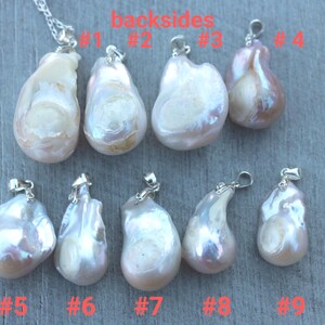 May include: Nine white and pink baroque pearl pendants with silver bails. The pearls are all different shapes and sizes. The pearls are labelled #1 through #9.