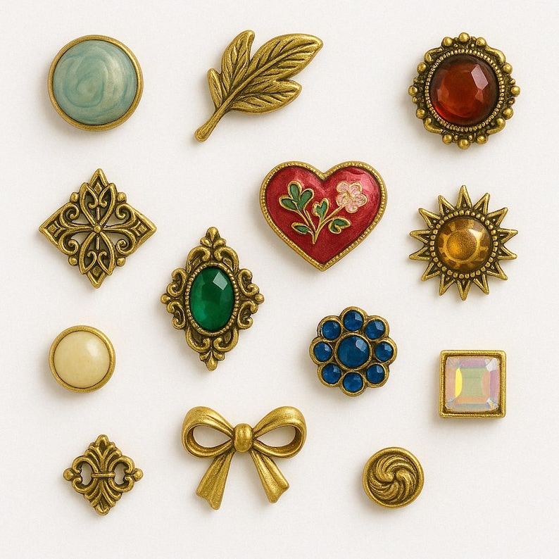 May include: Assortment of decorative metal buttons with various designs, including a heart, a sun, a leaf, a bow, and a swirl. The buttons are in shades of gold, red, blue, green, and brown.