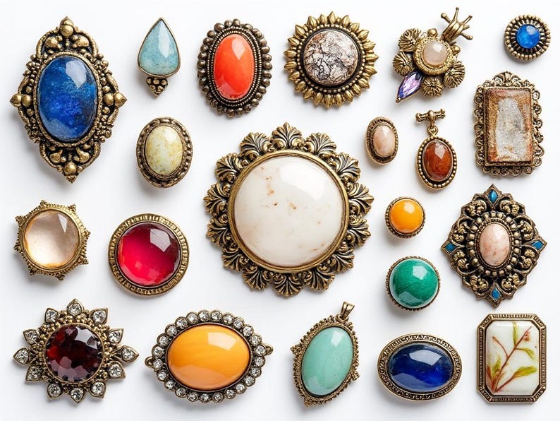 May include: Assortment of vintage brooches with various colored stones and metal settings. The brooches feature a variety of designs, including floral, geometric, and abstract patterns.