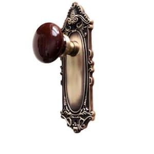 Rousso's Reproductions Victorian Style Dummy Backplate with Porcelain Brown Door Knob, Antique Brass