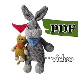May include: A large gray crocheted rabbit with long ears and a blue bandana, a smaller yellow crocheted cat with a red bandana, and an extra red bandana. The image includes the text PDF and + video, indicating a digital pattern and tutorial.