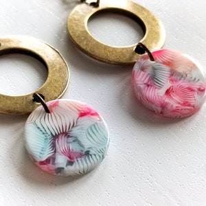 Bronze round connector earrings - round blue and pink floral acetate