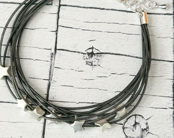 Bracciale multifilo a stella in grigio e argento
